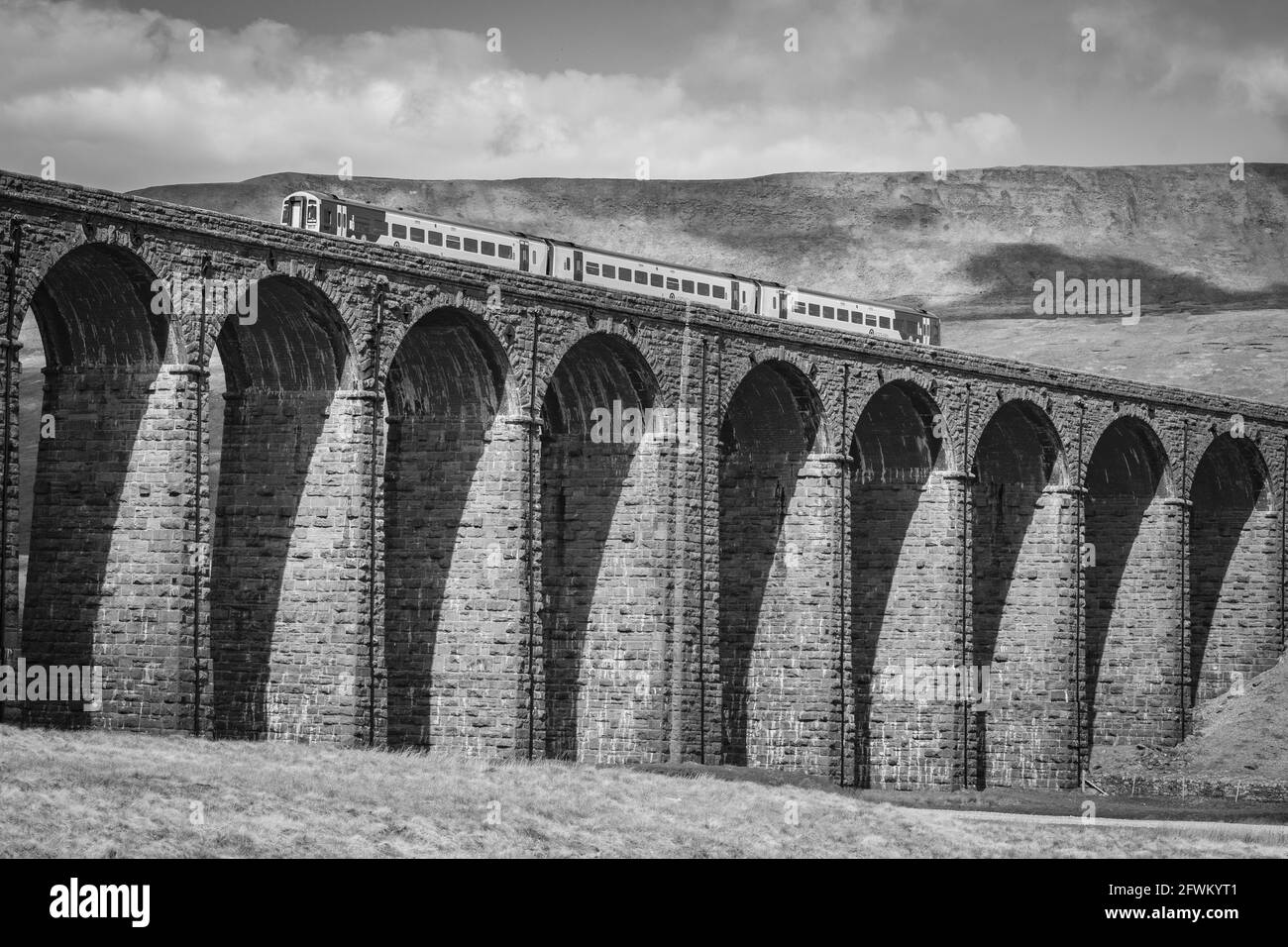 Freight train crossing viaduct Black and White Stock Photos & Images