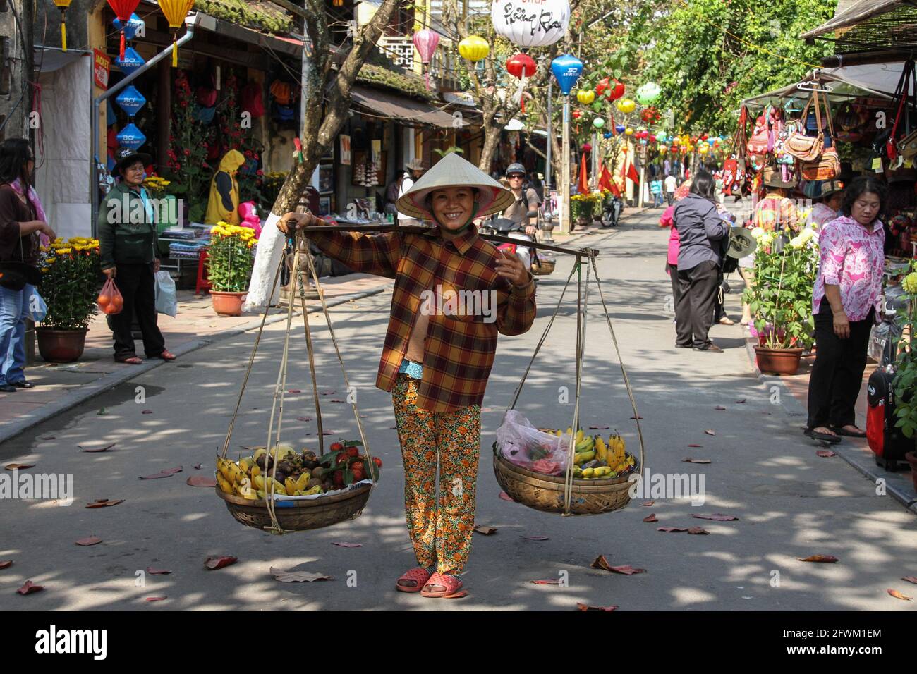 Female Vietnamese Street Vendor Stock Photo