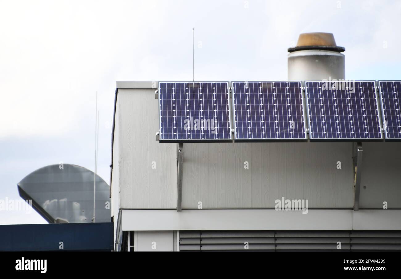 pv modules at industrial fassade Stock Photo