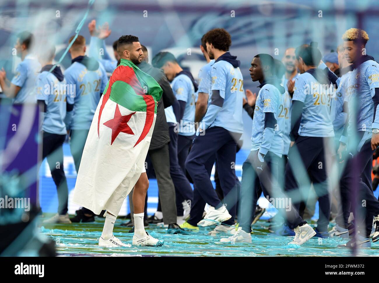 Manchester City's Riyad Mahrez with the Flag of Algeria after the Premier League match at the Etihad Stadium, Manchester. Picture date: Sunday May 23, 2021. Stock Photo