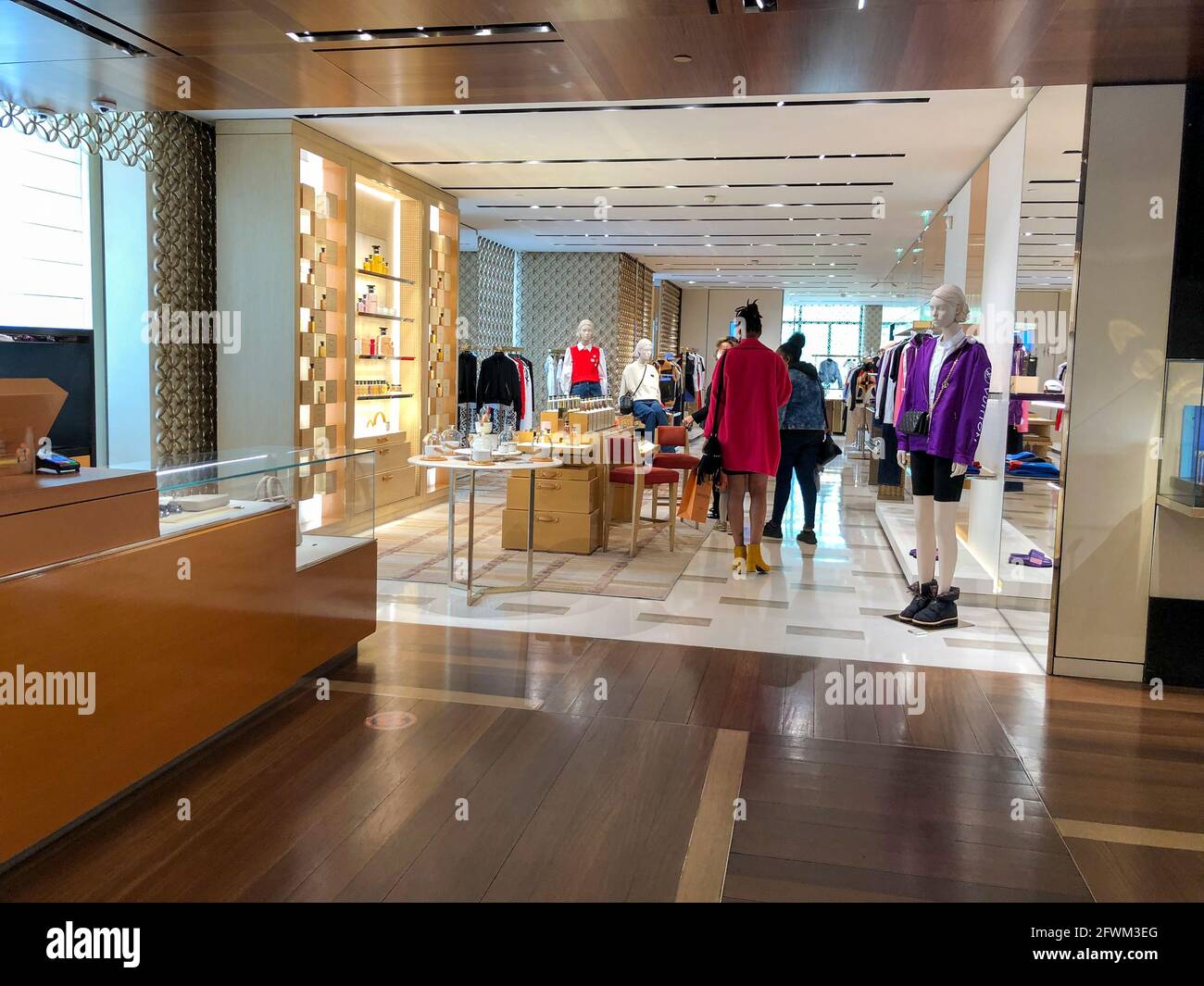 Paris, France, inside LVMH, Louis Vuitton Luxury clothing store at Paris,  Shopping, Ave Champs-Elysees, contemporary interior Stock Photo - Alamy