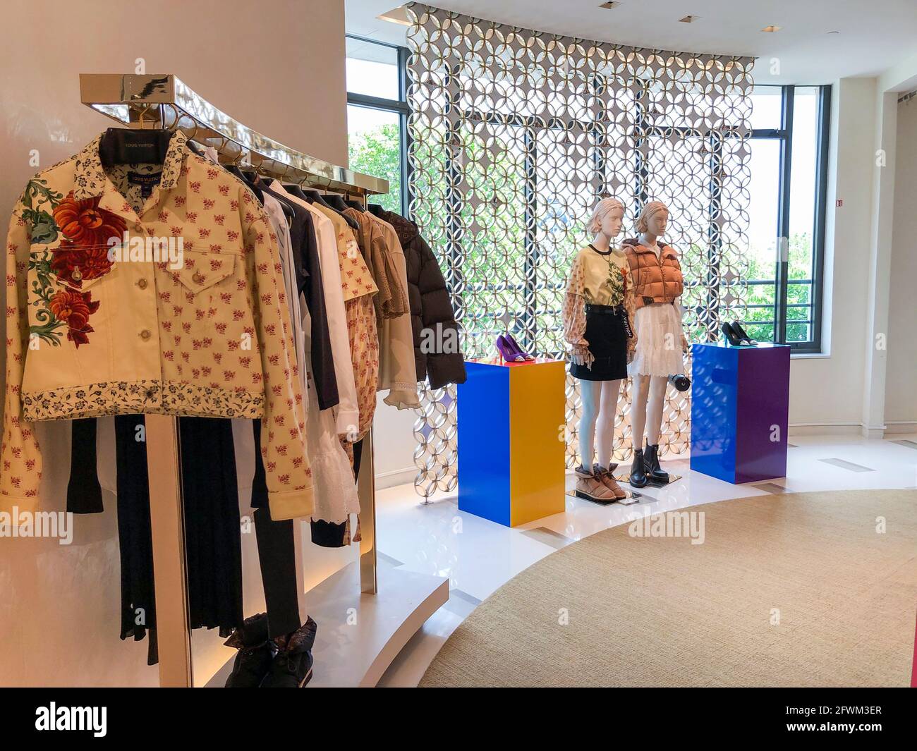 Paris, France, inside LVMH, Louis Vuitton Luxury clothing store at Paris,  Ave.. Champs-Elysees, fashion mannequins on display in boutique, finished  products Stock Photo - Alamy