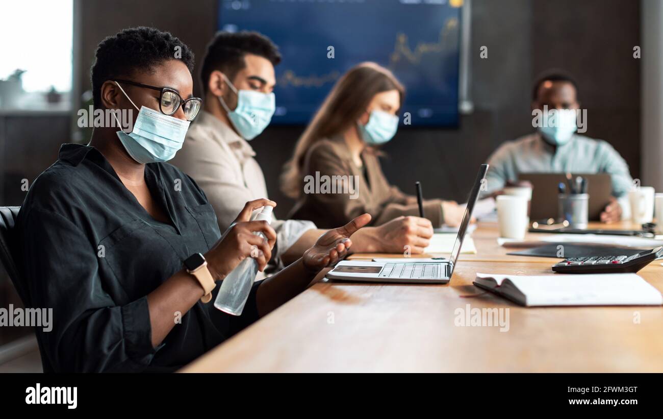 International people wearing medical masks woman using sanitizer Stock ...