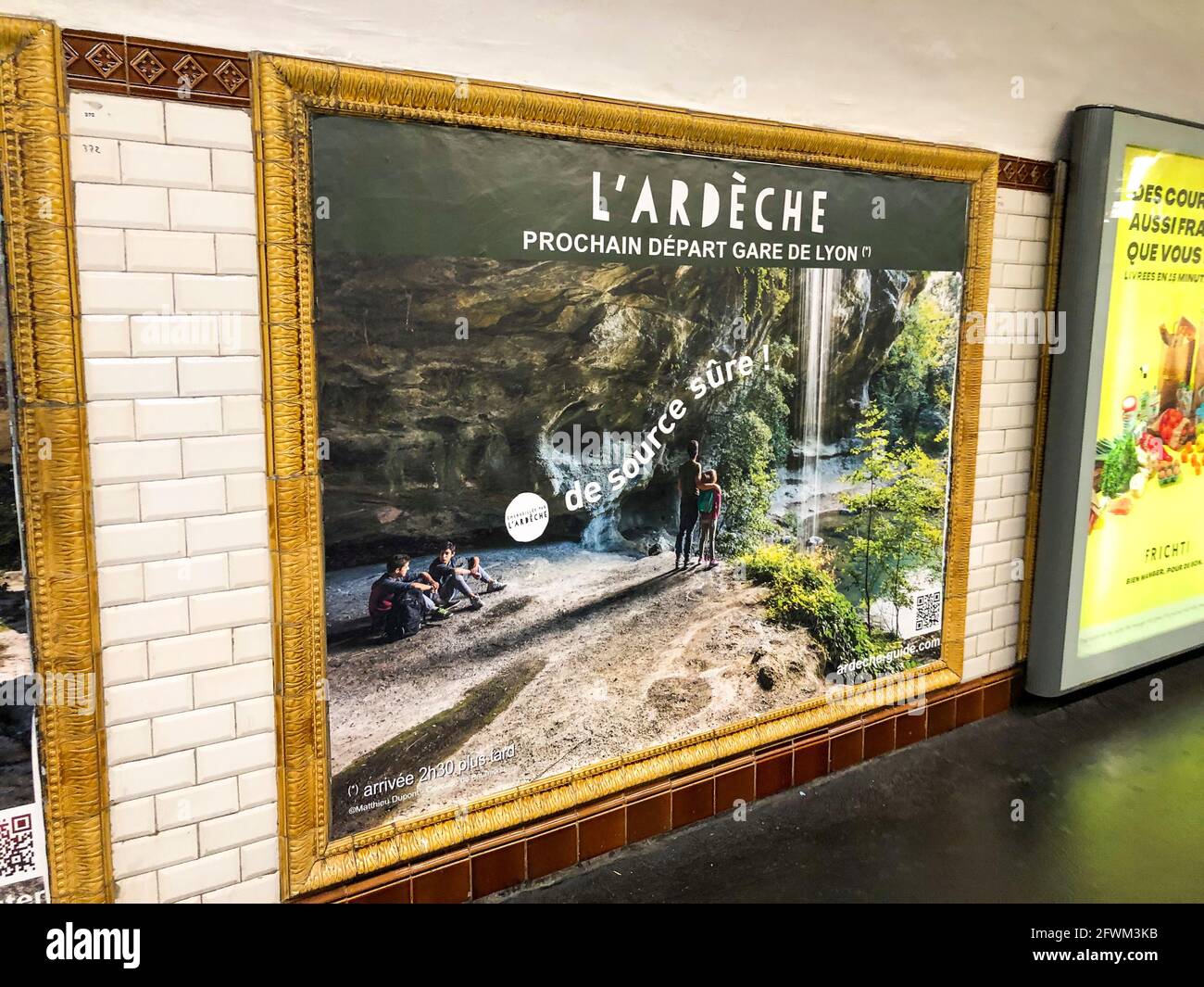 Paris, France, French Travel Poster in subway station wall, Metro