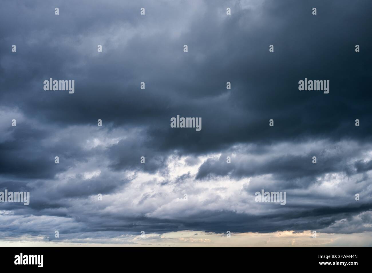 Dark dramatic sky and stormy clouds background Stock Photo