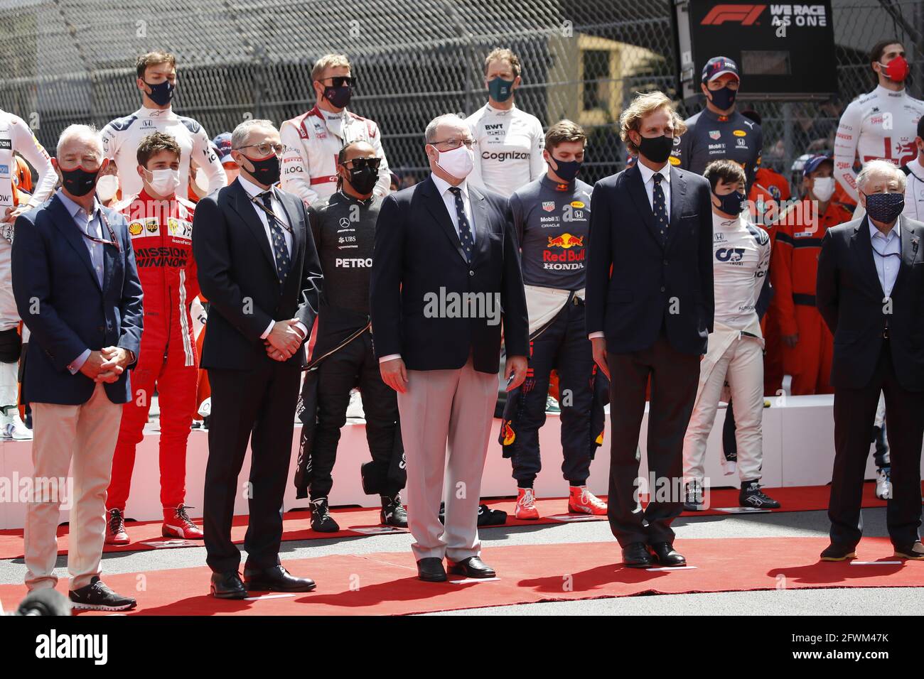 Monte Carlo, Monaco. 23rd May, 2021. (L to R): gma Greg Maffei (USA) Liberty Media Corporation President and Chief Executive Officer with Stefano Domenicali (ITA) Formula One President and CEO and HSH Prince Albert of Monaco (MON) on the grid. Monaco Grand Prix, Sunday 23rd May 2021. Monte Carlo, Monaco. © Copyright: FIA Pool Image for Editorial Use Only Credit: James Moy/Alamy Live News Stock Photo