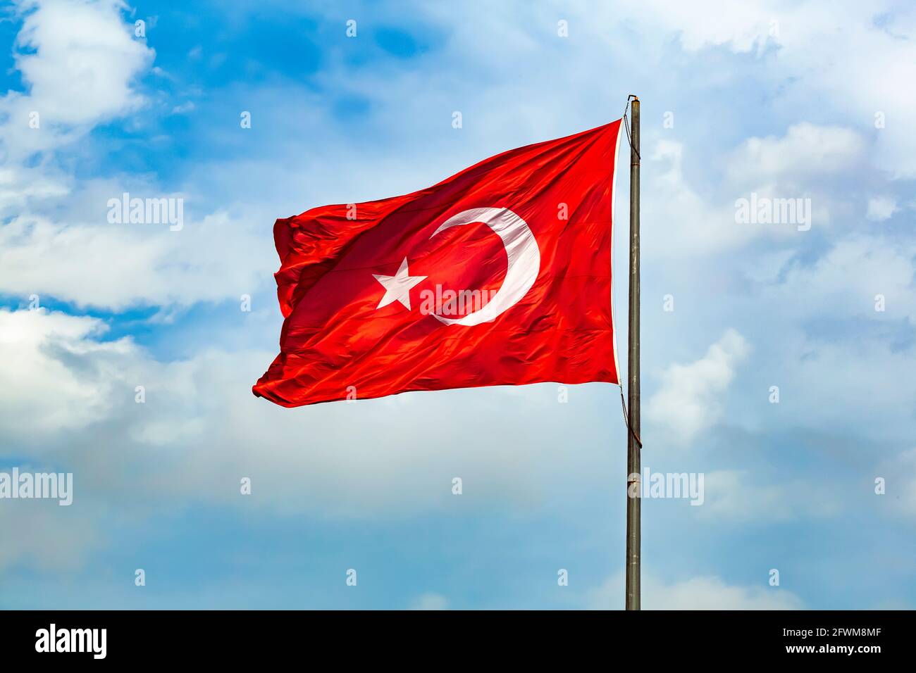 The Turkish flag is the national and official flag of the Republic of Turkey. [1] It is formed with a white crescent and star on a red background. Dur Stock Photo