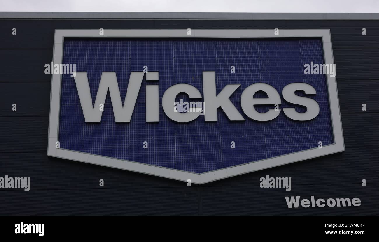 Logo of Wickes seen on the exterior of an outlet in the UK Stock Photo