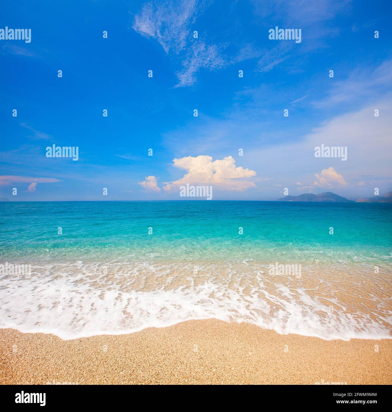 Sandy beach and beautiful tropical sea Stock Photo - Alamy