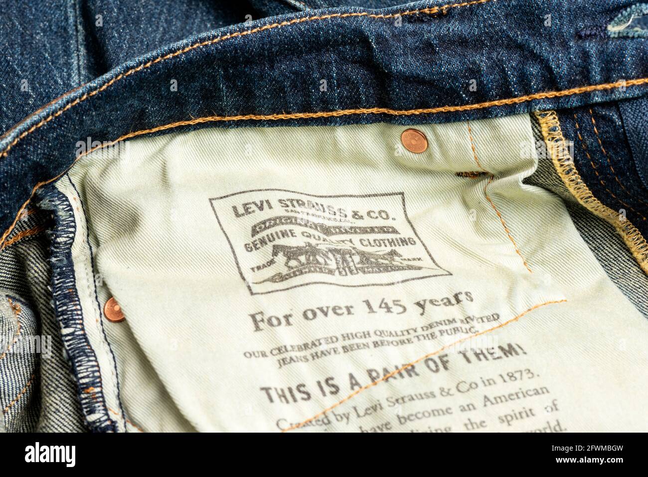 Levi's pair of jeans inside text and label Stock Photo