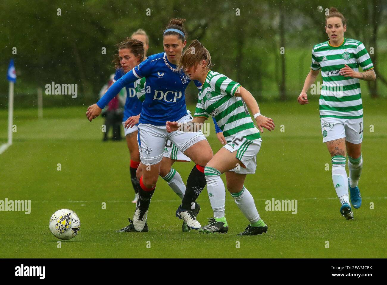 Milngavie, East Dunbartonshire, Scotland. 23rd May, 2021. Zoe Ness (#9) of Rangers Women FC shields the ball from Chloe Warrington (#22) of Celtic Women FC during the Scottish Building Society Scottish Women's Premier League 1 Fixture Rangers FC vs Celtic FC, Rangers Training Complex, Milngavie, East Dunbartonshire, 23/05/2021 | Credit Colin Poultney | www.Alamy.co.uk Credit: Colin Poultney/Alamy Live News Stock Photo