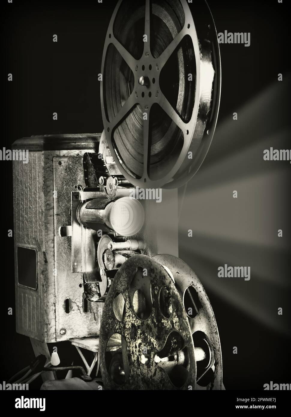 Antique movie projector in black and white. Stock Photo