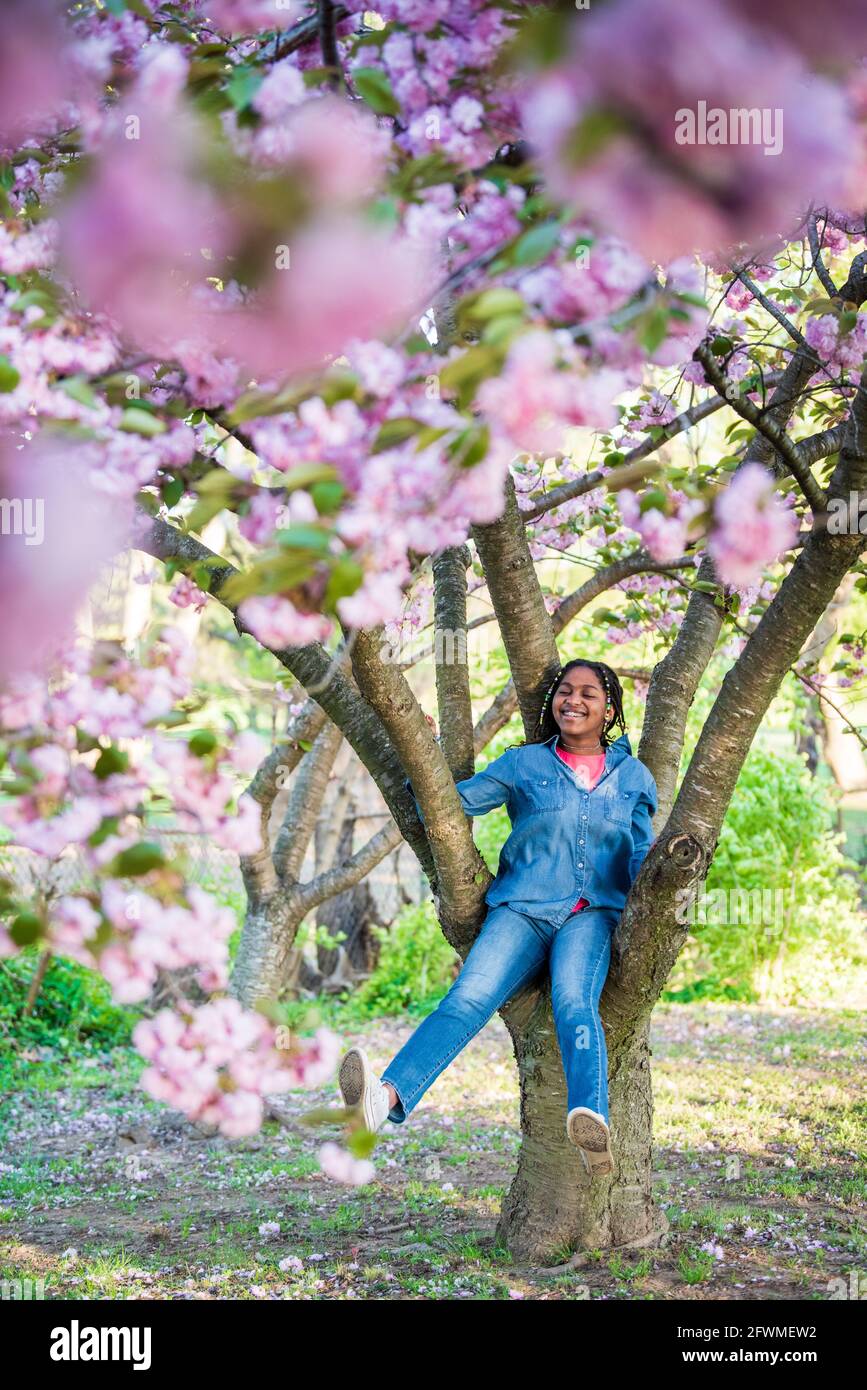 A Black teenage girl poses for the camera. Stock Photo