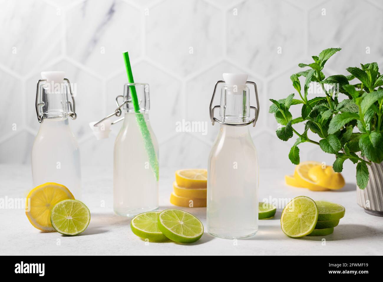 Fresh lime and lemon lemonade on the kitchen counter Stock Photo Alamy