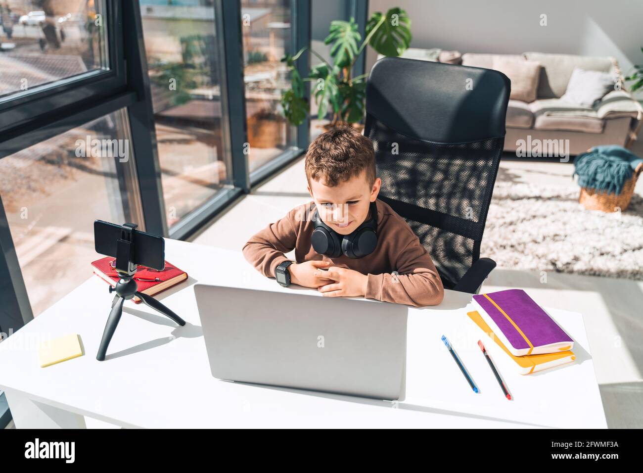 School boy studying online using hi-res stock photography and images ...