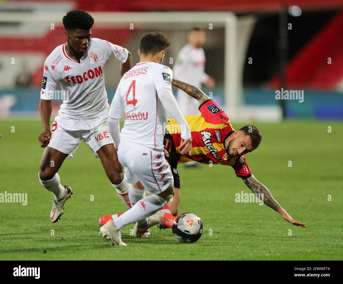 Soccer Football - Ligue 1 - RC Lens v AS Monaco - Stade Bollaert-Delelis,  Lens, France - May 23, 2021 AS Monaco's Cesc Fabregas in action with RC Lens'  Jonathan Clauss REUTERS/Pascal Rossignol Stock Photo - Alamy