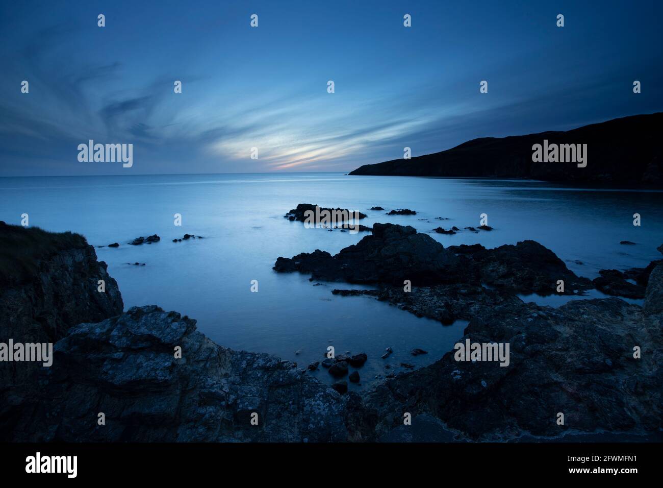 Dusk at Church Bay, Anglesey, North Wales Stock Photo