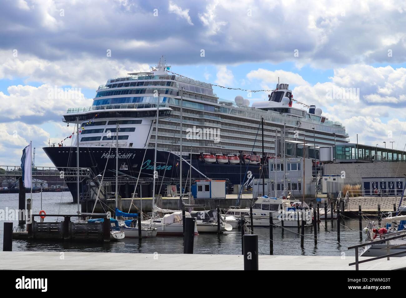  The big german cruise ship called Mein Schiff 1 in the port of Kiel in Illustration 