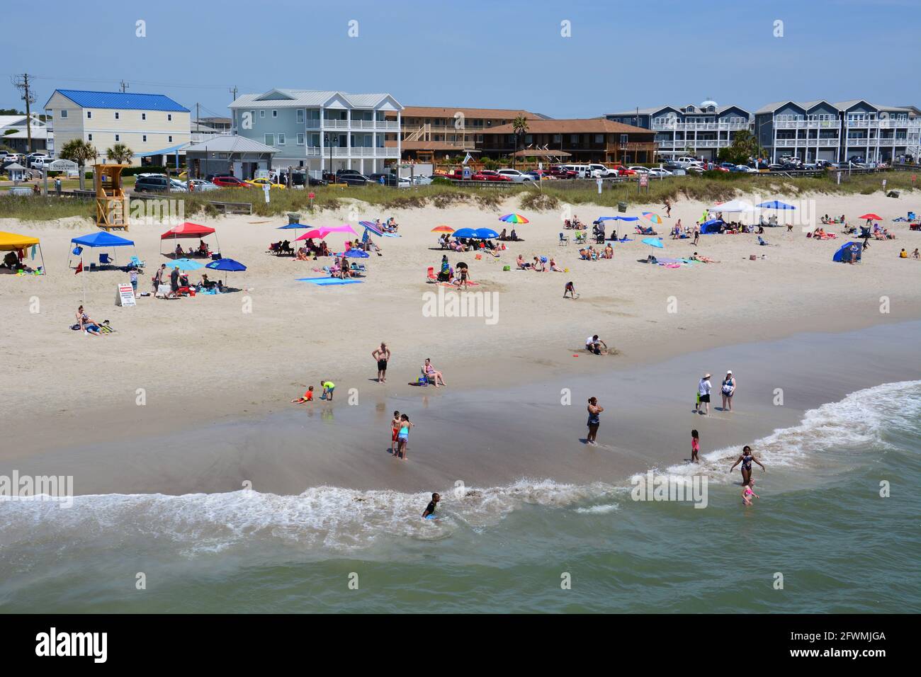Crowds fill the beach at Kure Beach, North Carolina Stock Photo Alamy