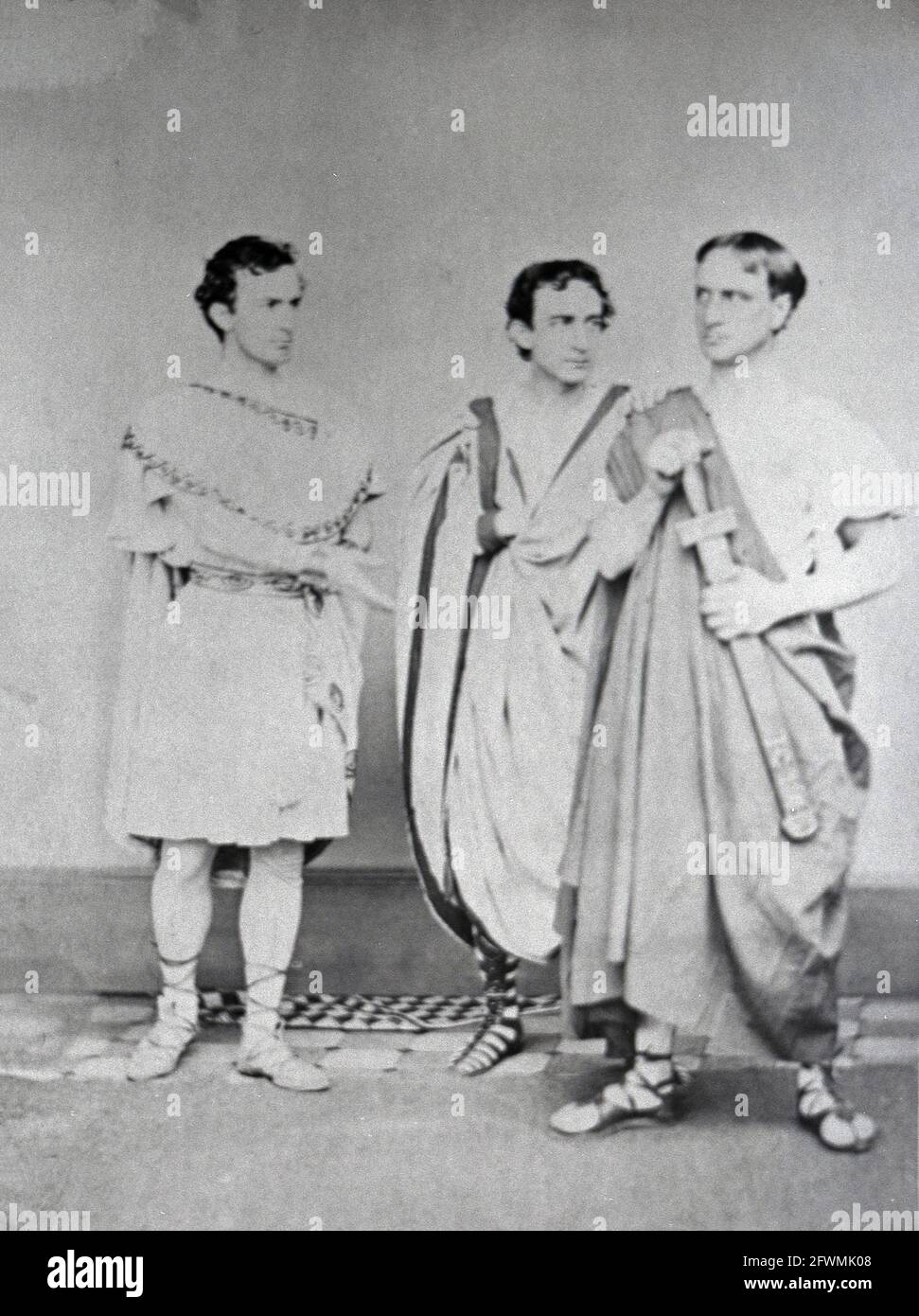 John Wilkes Booth, left, with brothers Edwin and Junius, Jr. in a benefit performance of Julius Caesar. Booth would play the role of Brutus Stock Photo