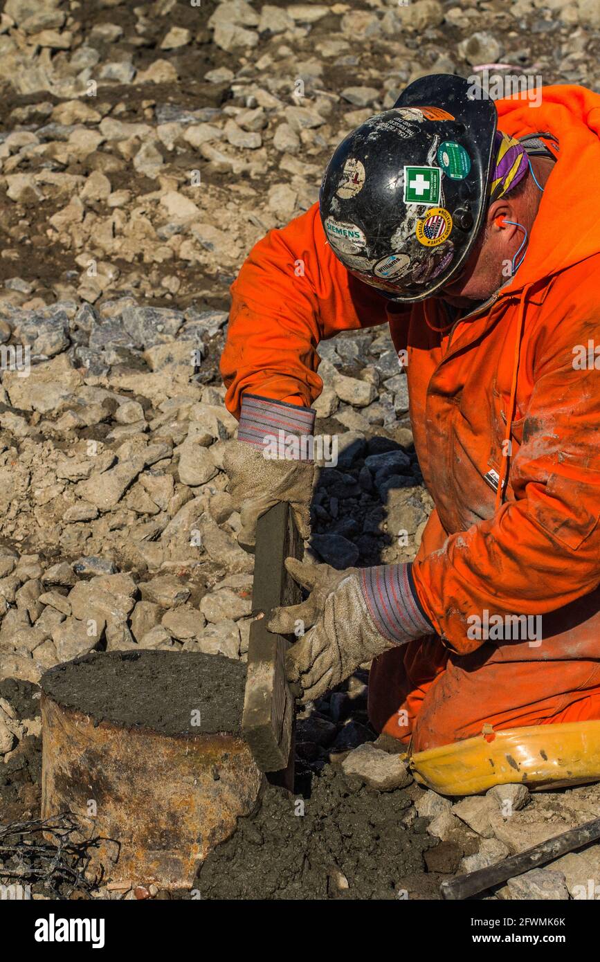 Oil refinery, industrial workers Stock Photo - Alamy