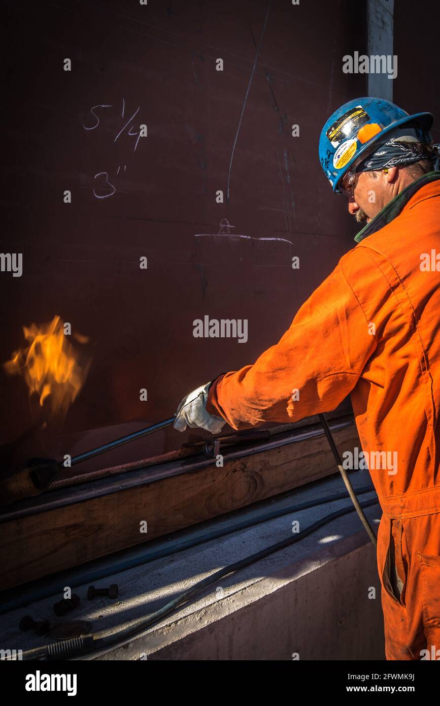 Oil refinery, industrial workers Stock Photo Alamy