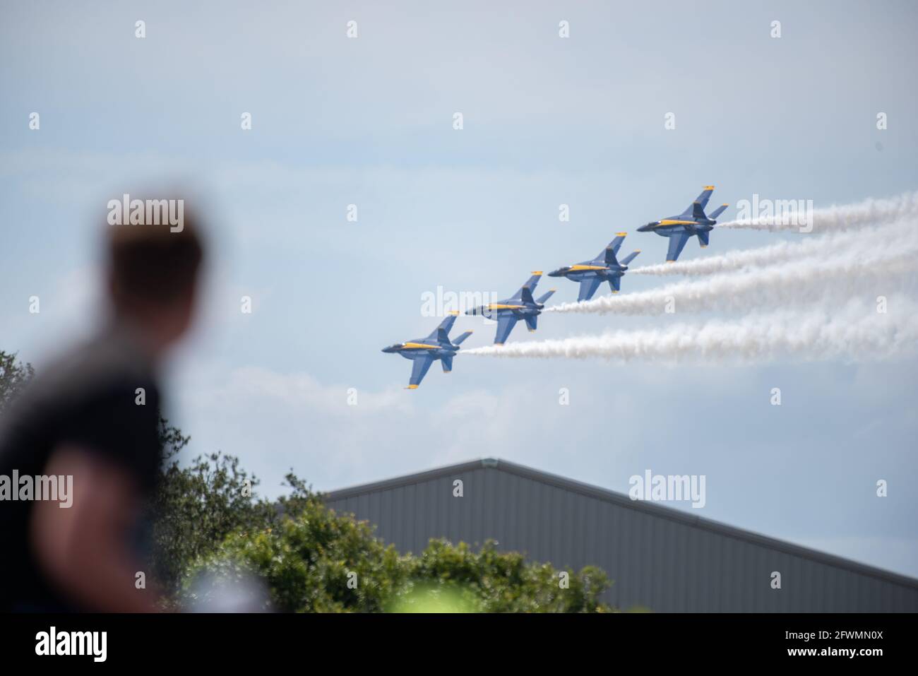 Onlooker Watching the Blue Angels Perform at an Airshow Stock Photo