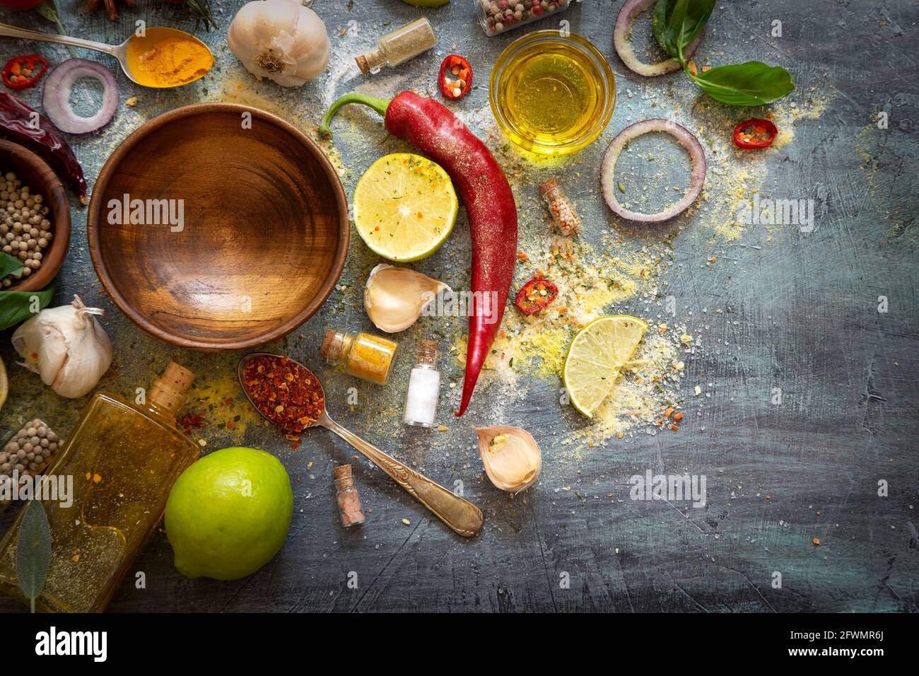 Various herbs and spices on grunge background Stock Photo