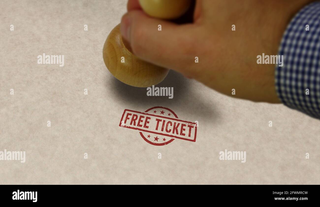 Free ticket stamp and stamping hand. Admission and free entry concept. Stock Photo