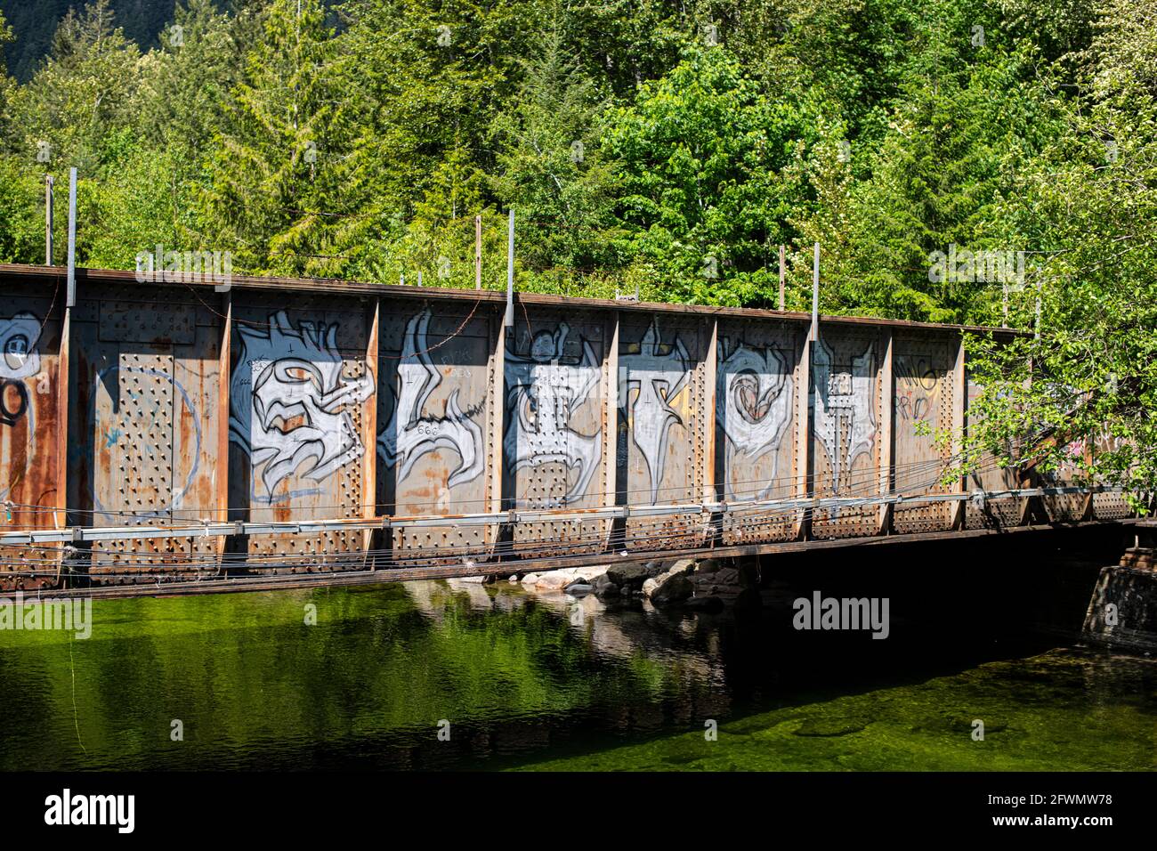Rail bridge over Norrish Creek in Dewdney, Mission, British Columbia, Canada Stock Photo