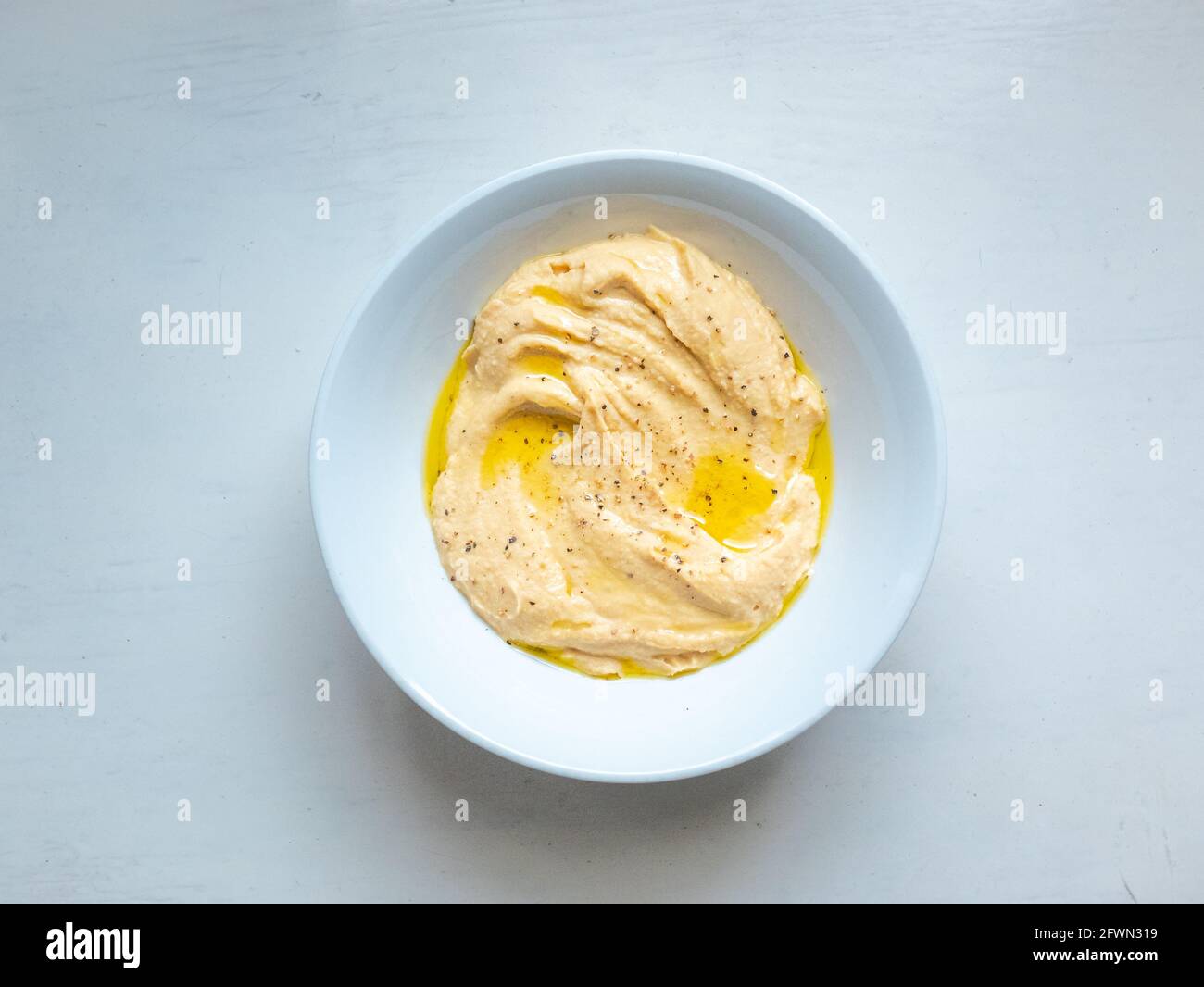 Delicious Hummus Prepared with Chickpeas, Garlic, Tahini, Lemon Juice