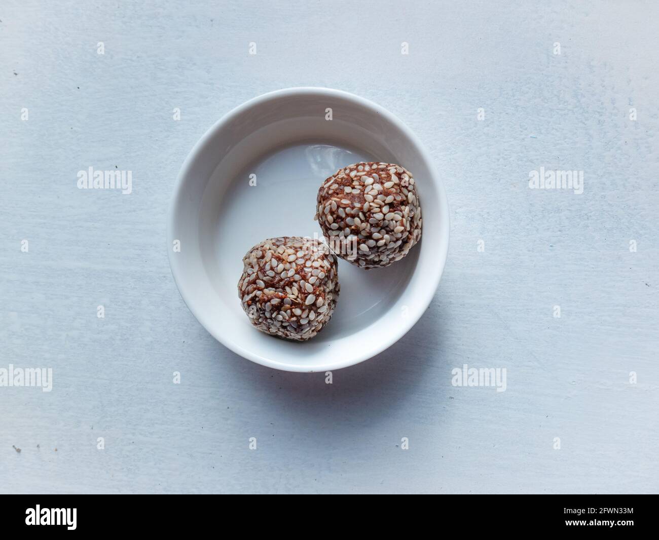 Oatmeal Balls with Cocoa, Peanut Butter, Maple Syrup and Sesame Seed