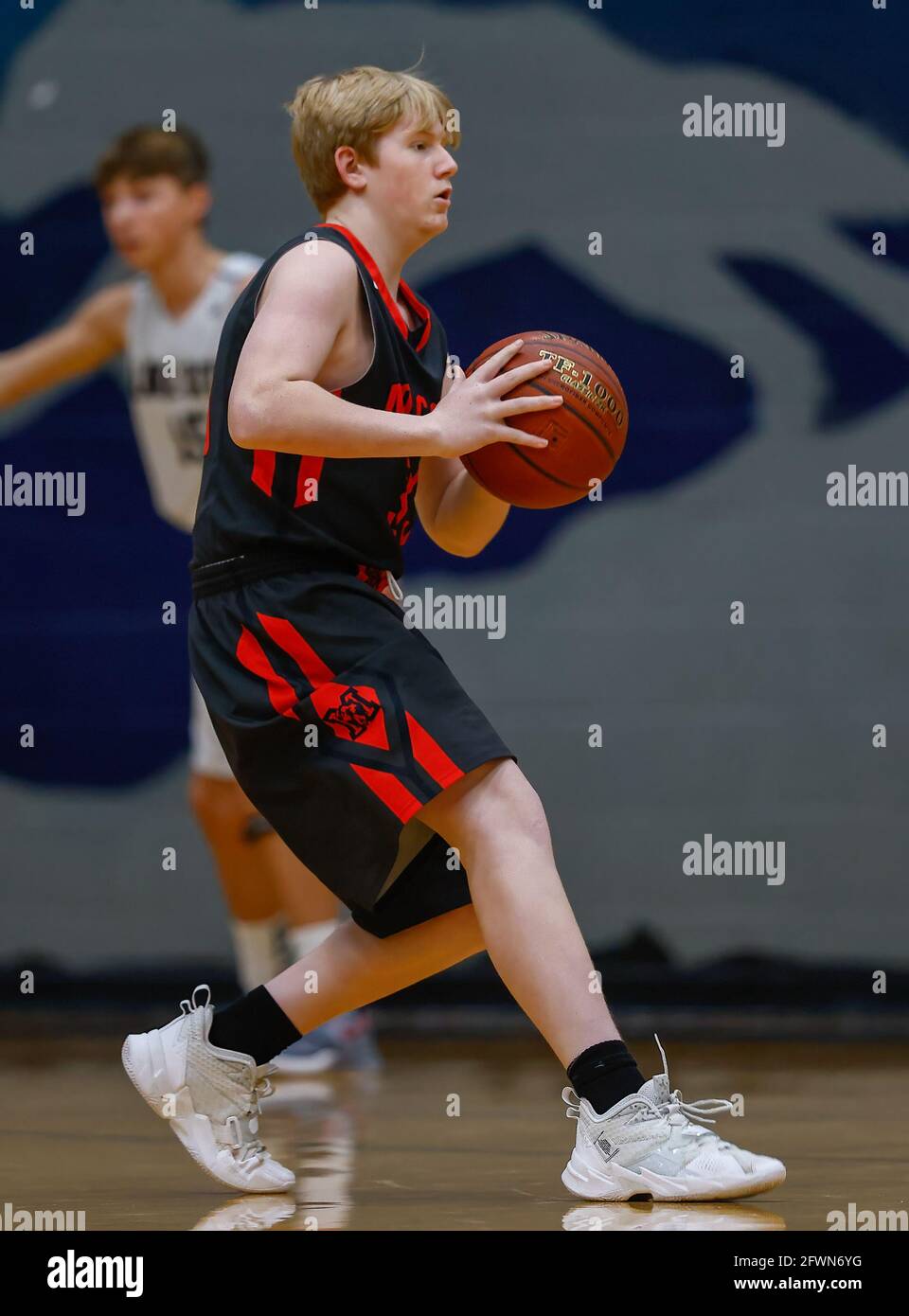 Freshmen basketball action with Moscow vs Lake City High School in Coeur d'Alene, Idaho. Stock Photo