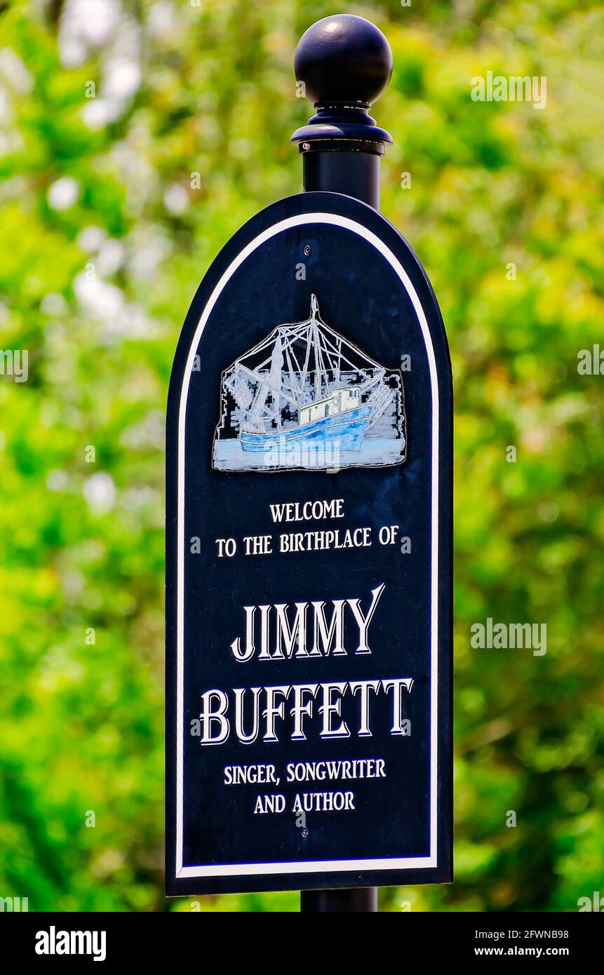 A sign along Highway 90 designates the City of Pascagoula as the birthplace of singer and songwriter Jimmy Buffett in Pascagoula, Mississippi. Stock Photo