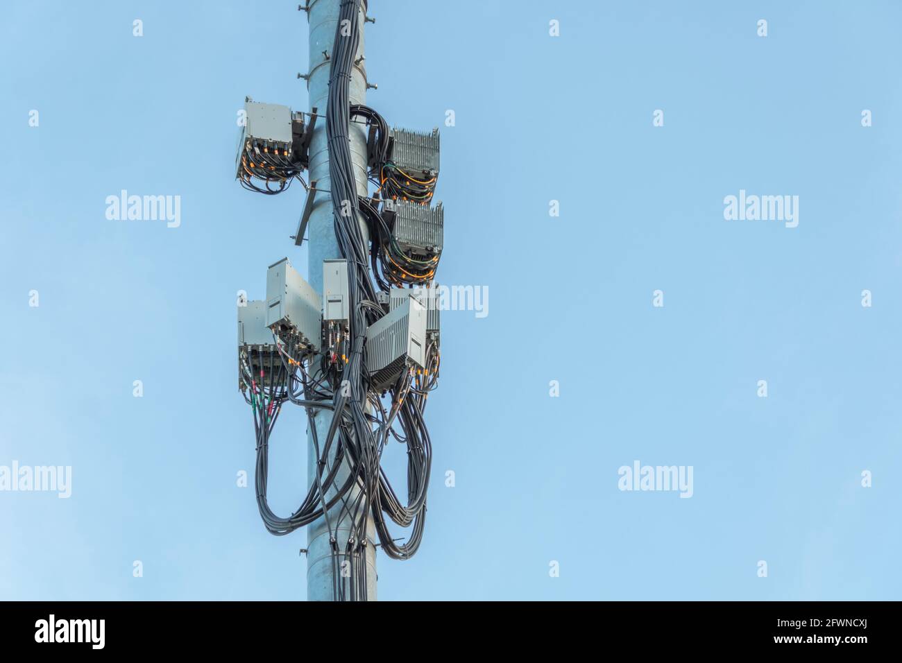 Cellular macro Base Transceiver Station. Telecommunication tower. Wireless Communication Antenna Transmitter. Transformers and Power Plants Distributo Stock Photo