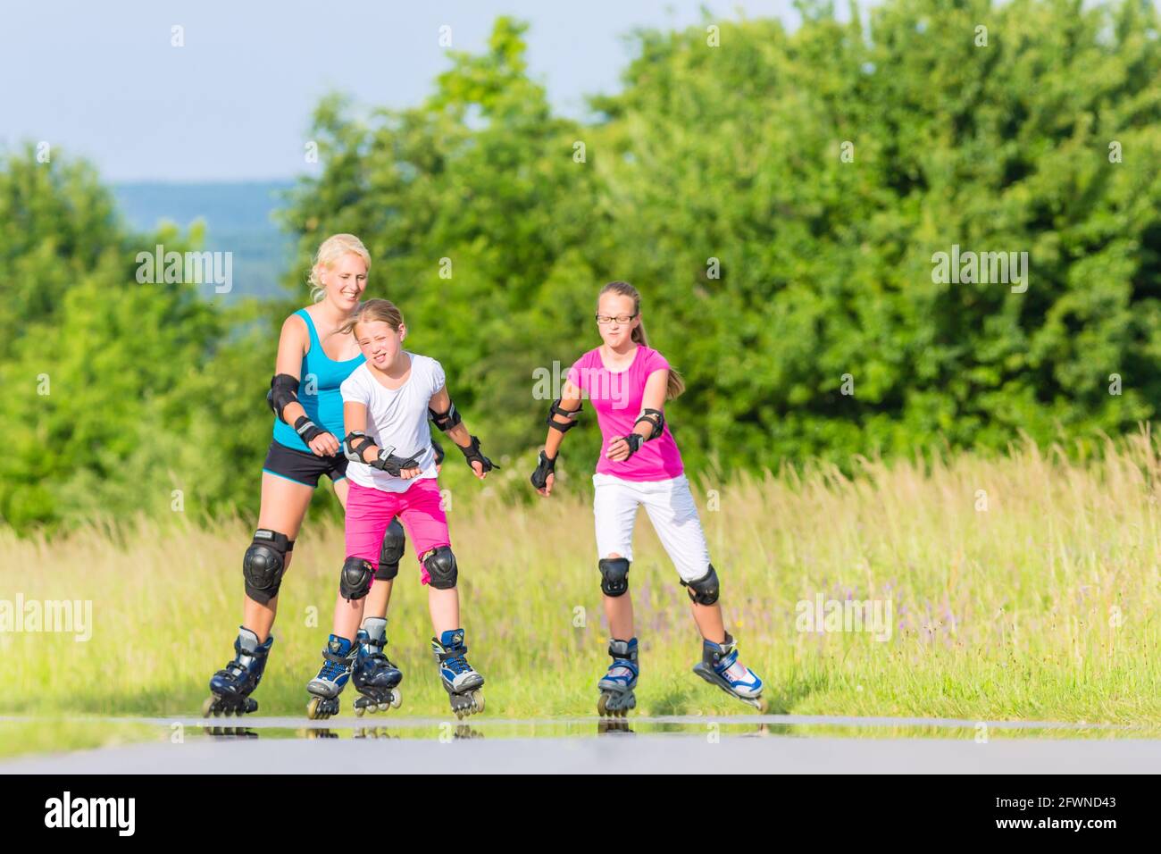 Family rollerblading hi-res stock photography and images - Page 2 - Alamy