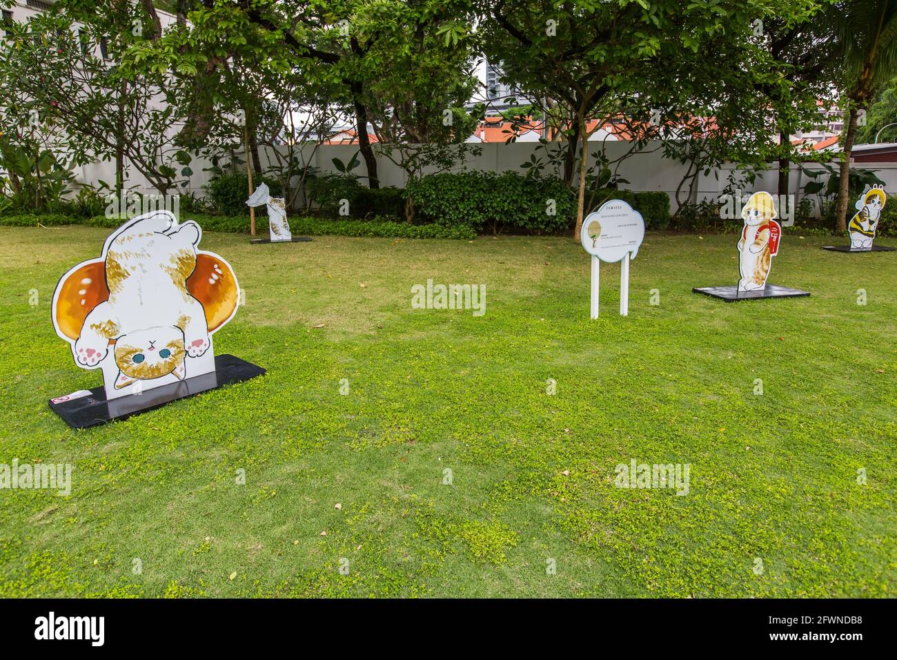 Paw-verbs on the Lawn pays tribute to the cat, its place in Malay literary culture and in the hearts of Singaporeans. Art work is by a japanese artist Stock Photo