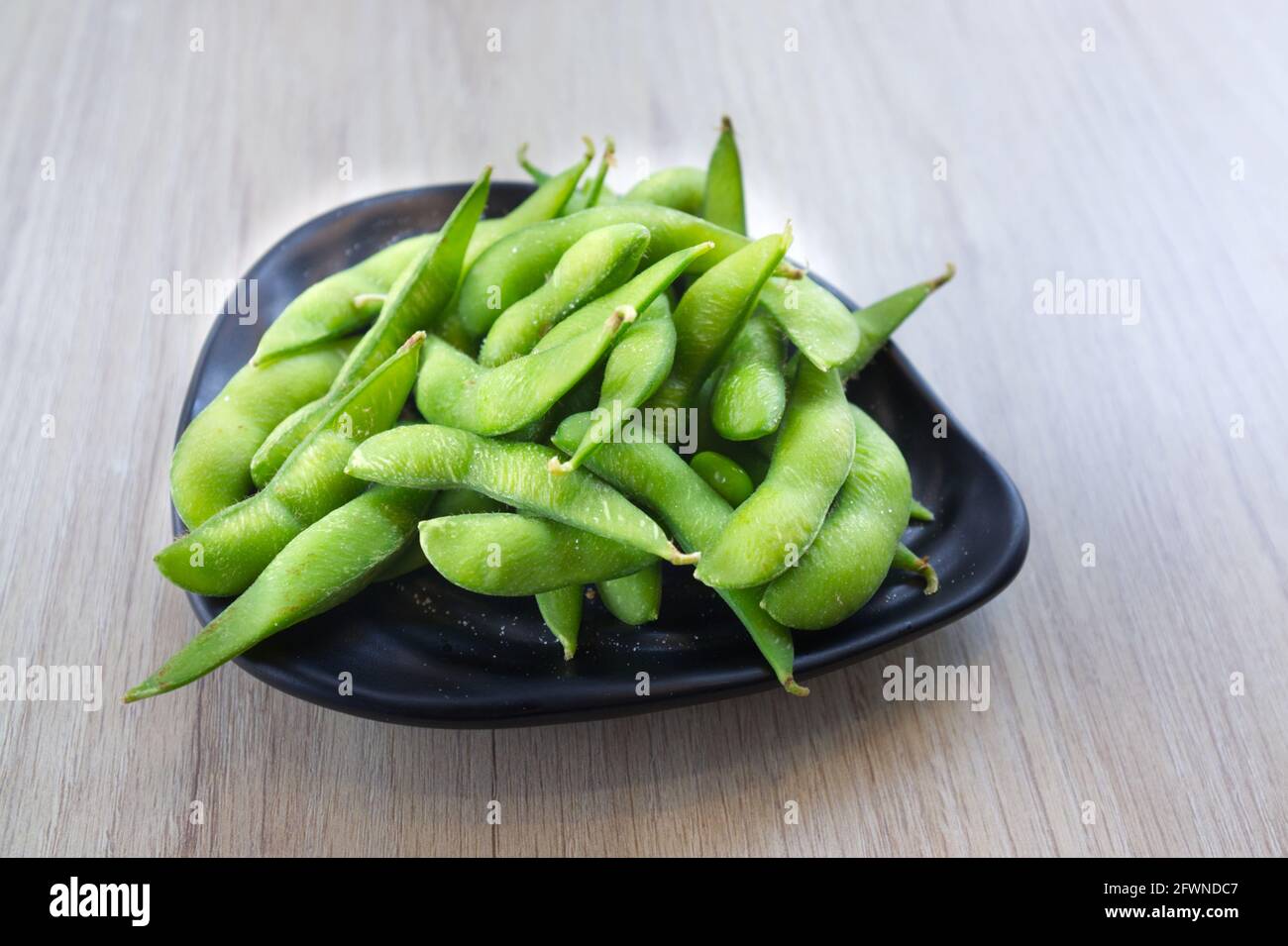 Japanese cuisine Edamame bean in bowl Stock Photo