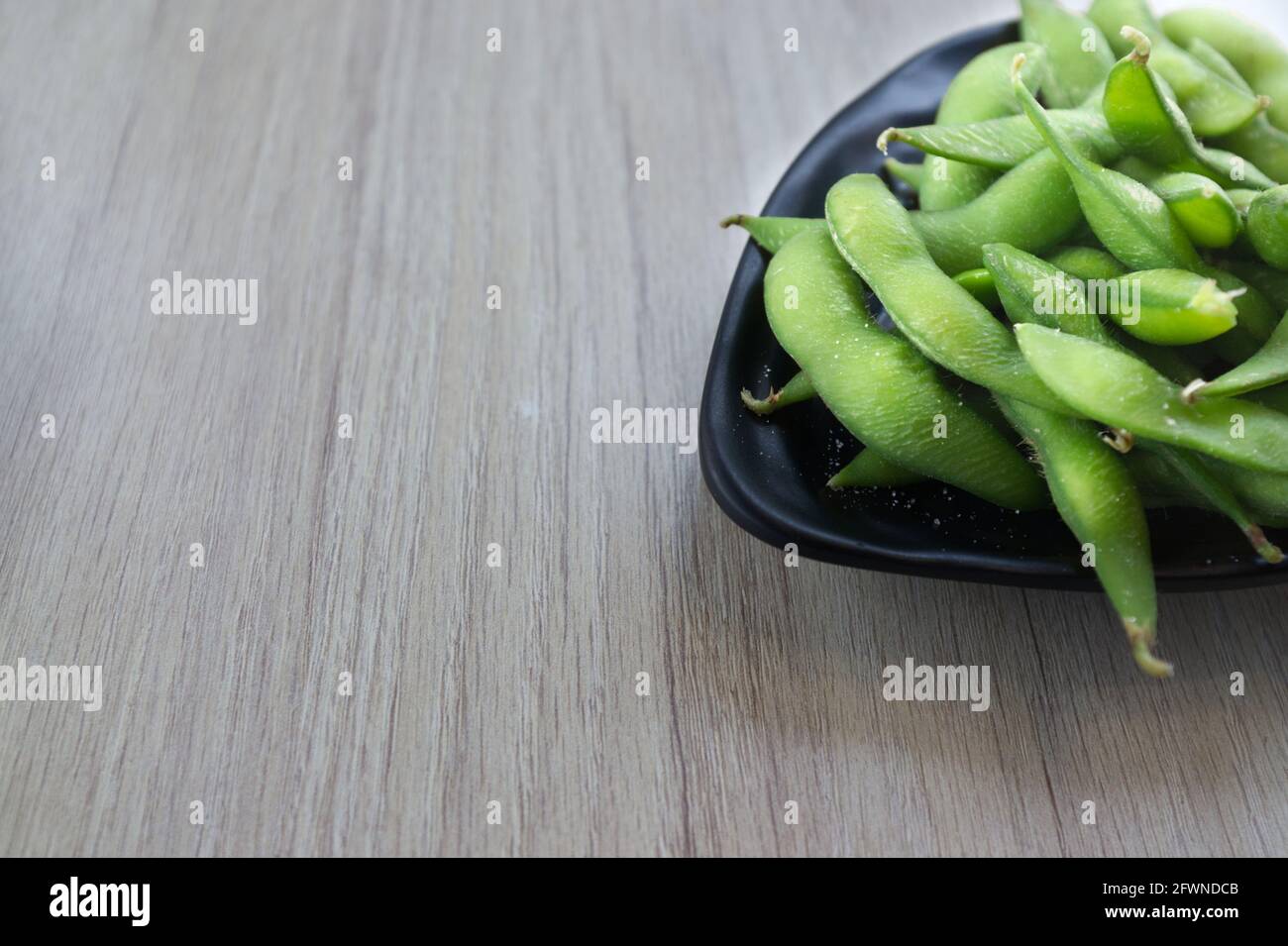 Japanese cuisine Edamame bean in bowl Stock Photo