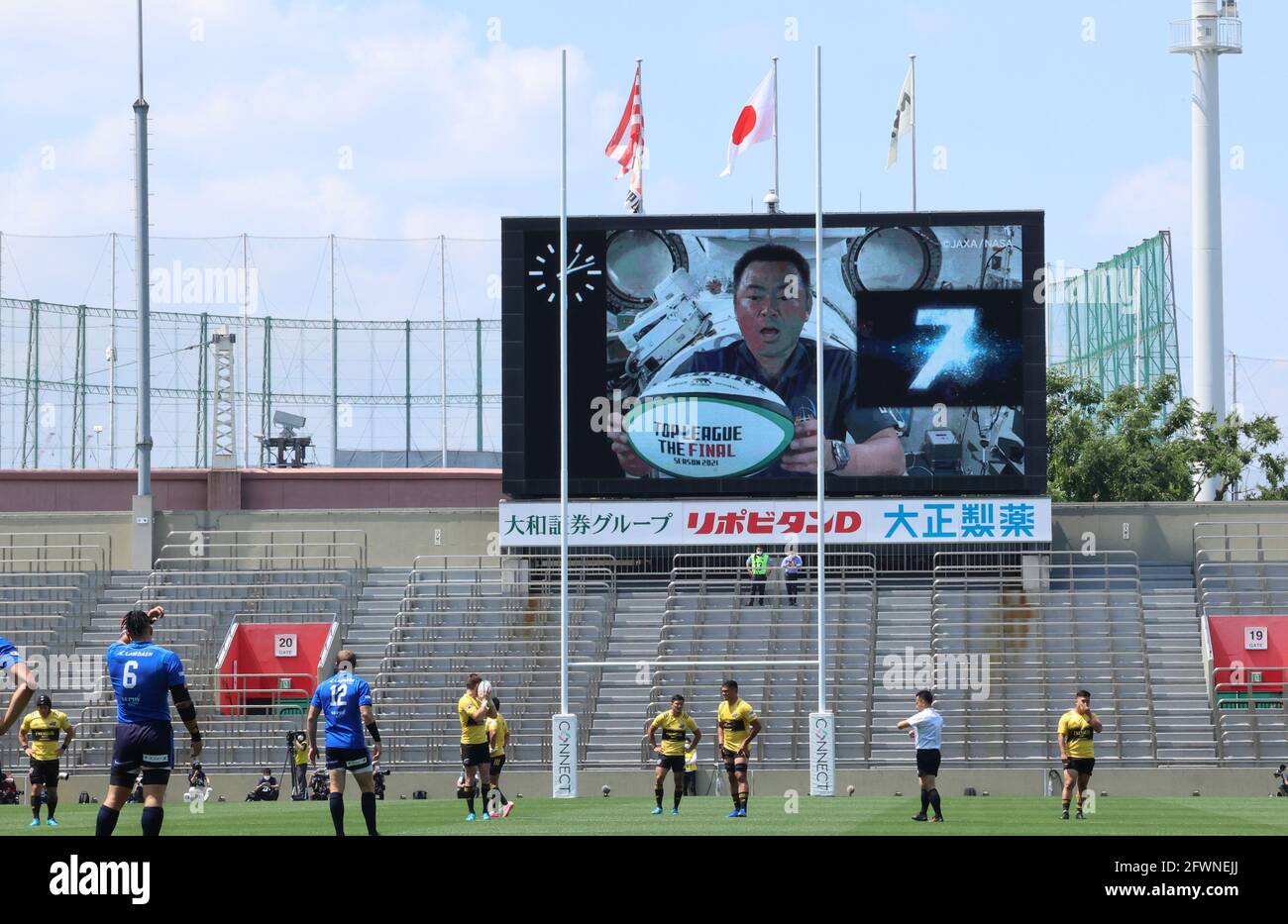 Tokyo, Japan. 23rd May, 2021. Japanese astronaut Akihiko Hoshide counts down for the kick off of the Japan Rugby Top League 2021 from the Internal Space Station (ISS) on a large screen at the Prince Chichibu rugby stadium in Tokyo on Sunday, May 23, 2021. Panasonic Wild Knights defeated Suntory Sungoliath 31-26 in the final. Credit: Yoshio Tsunoda/AFLO/Alamy Live News Stock Photo