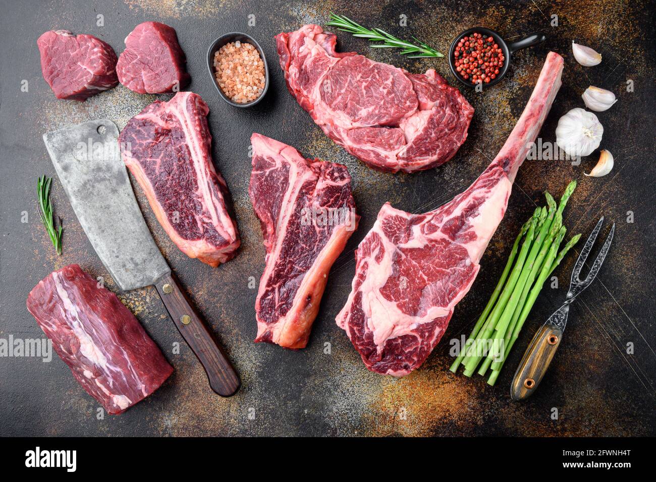 Variety of Raw Black Angus Prime meat steaks set, tomahawk, t bone