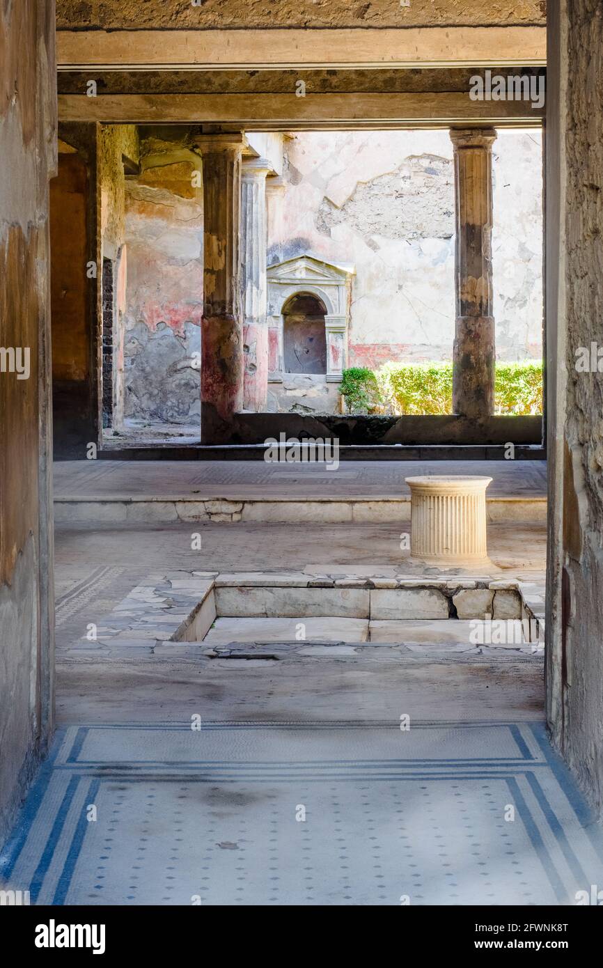Atrium with a central, marble lined impluvium in the house of the Tragic Poet (casa del poeta tragico) - Pompeii archaeological site, Italy Stock Photo