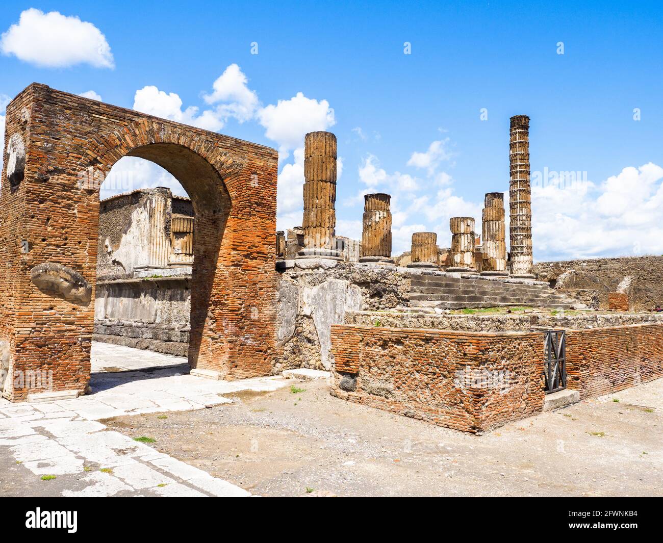 The Temple of Jupiter in the north side of the Forum, dedicated to the Capitoline triad of Jupiter, Juno and Minerva,  It dates from the 2nd century BC - Pompeii archaeological site, Italy Stock Photo