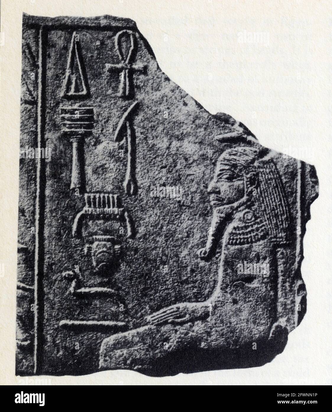 Relief of the earth god Geb shown swathed in a tight-fitting cloak.From a shrine to the pharaoh Zoser at Heliopolis.III Dynasty.2670 BC Stock Photo