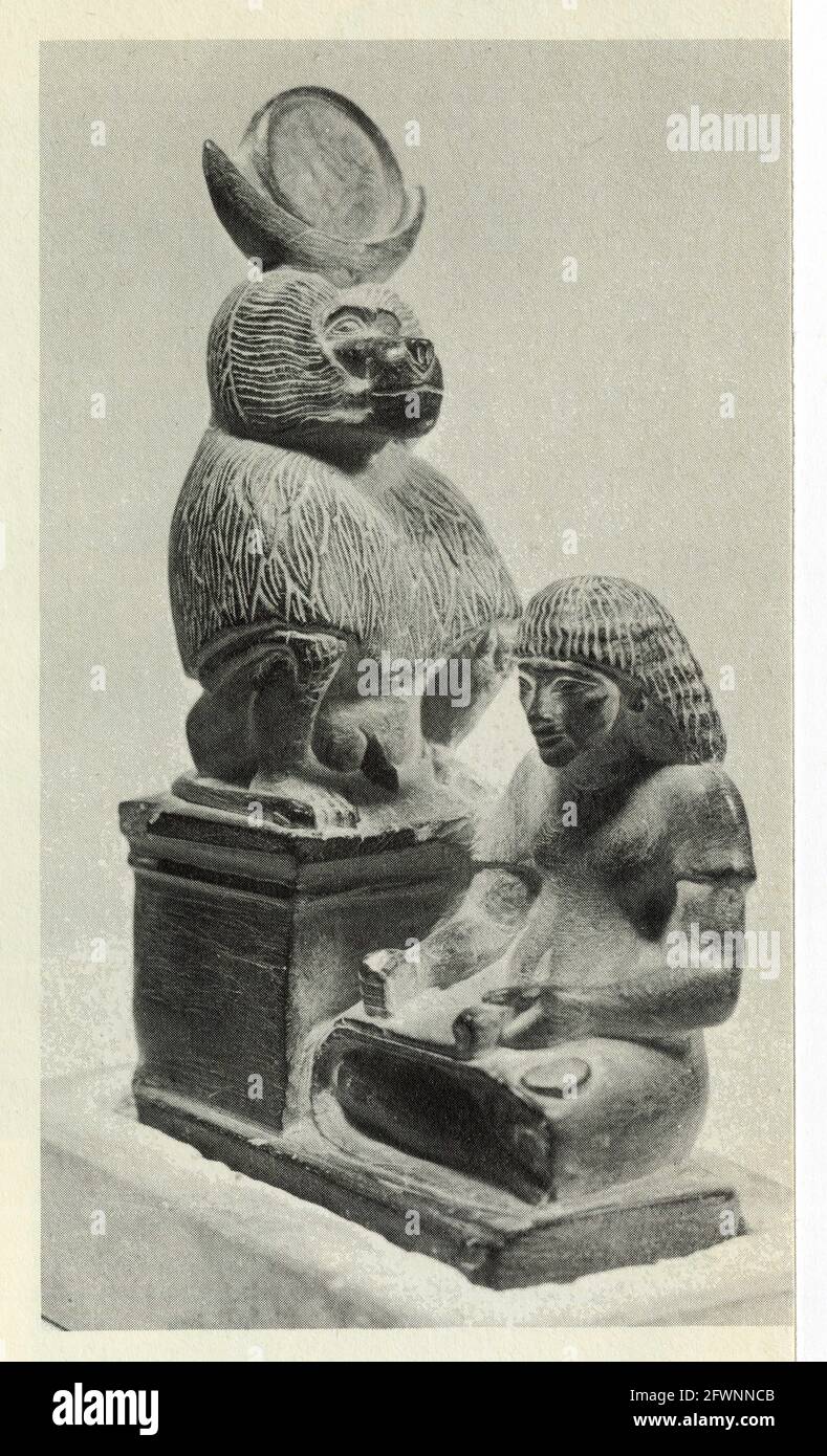 Both the ibis and the baboon were sacred to the god Thoth.Here,in his baboon aspect,he is represented as the patron of scribes.From Amarna.XVIII Dynas Stock Photo