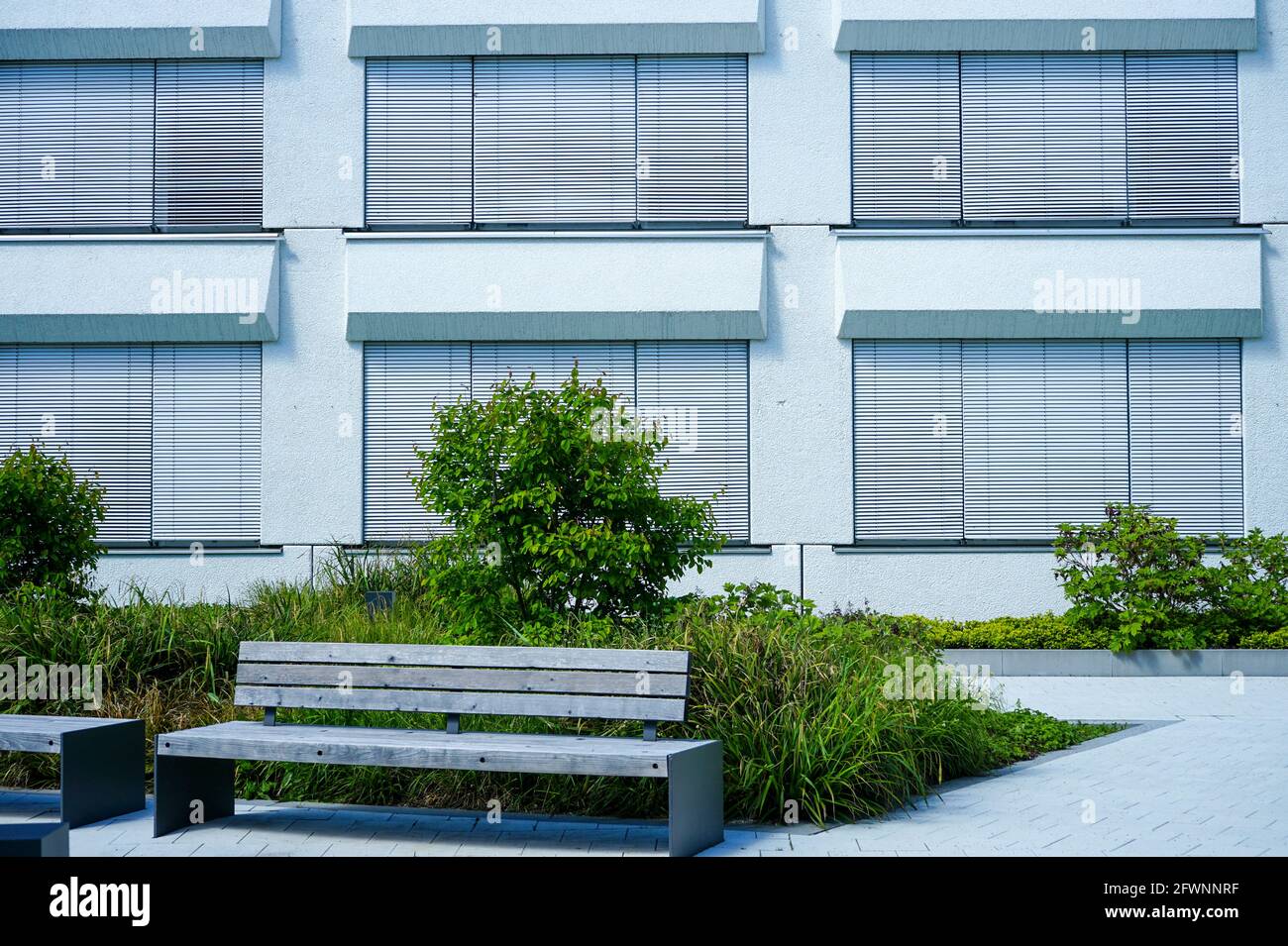 View of the beautifully landscaped inner courtyard of the 'Das Leuchtenberg' office building complex. Stock Photo