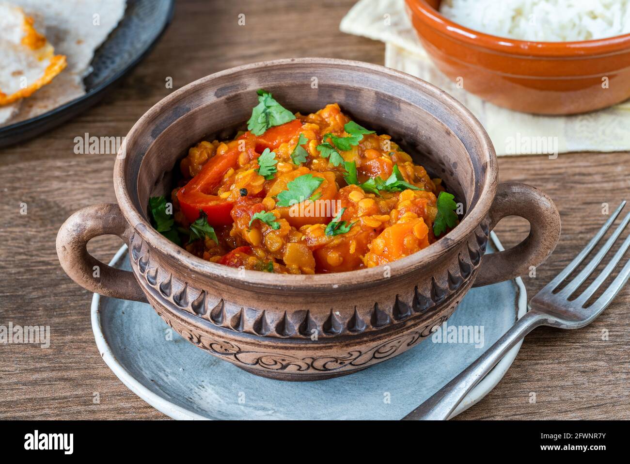 Indian vegetarian red lentil dhal curry Stock Photo - Alamy