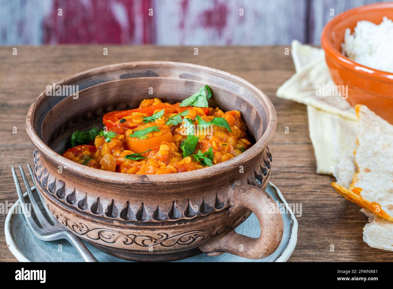 Indian vegetarian red lentil dhal curry Stock Photo - Alamy