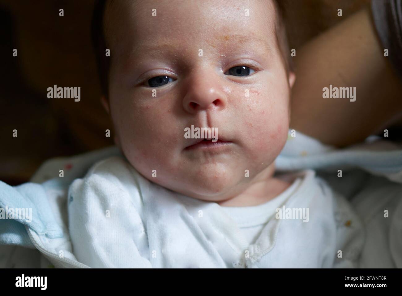 Tired baby after a long day Stock Photo