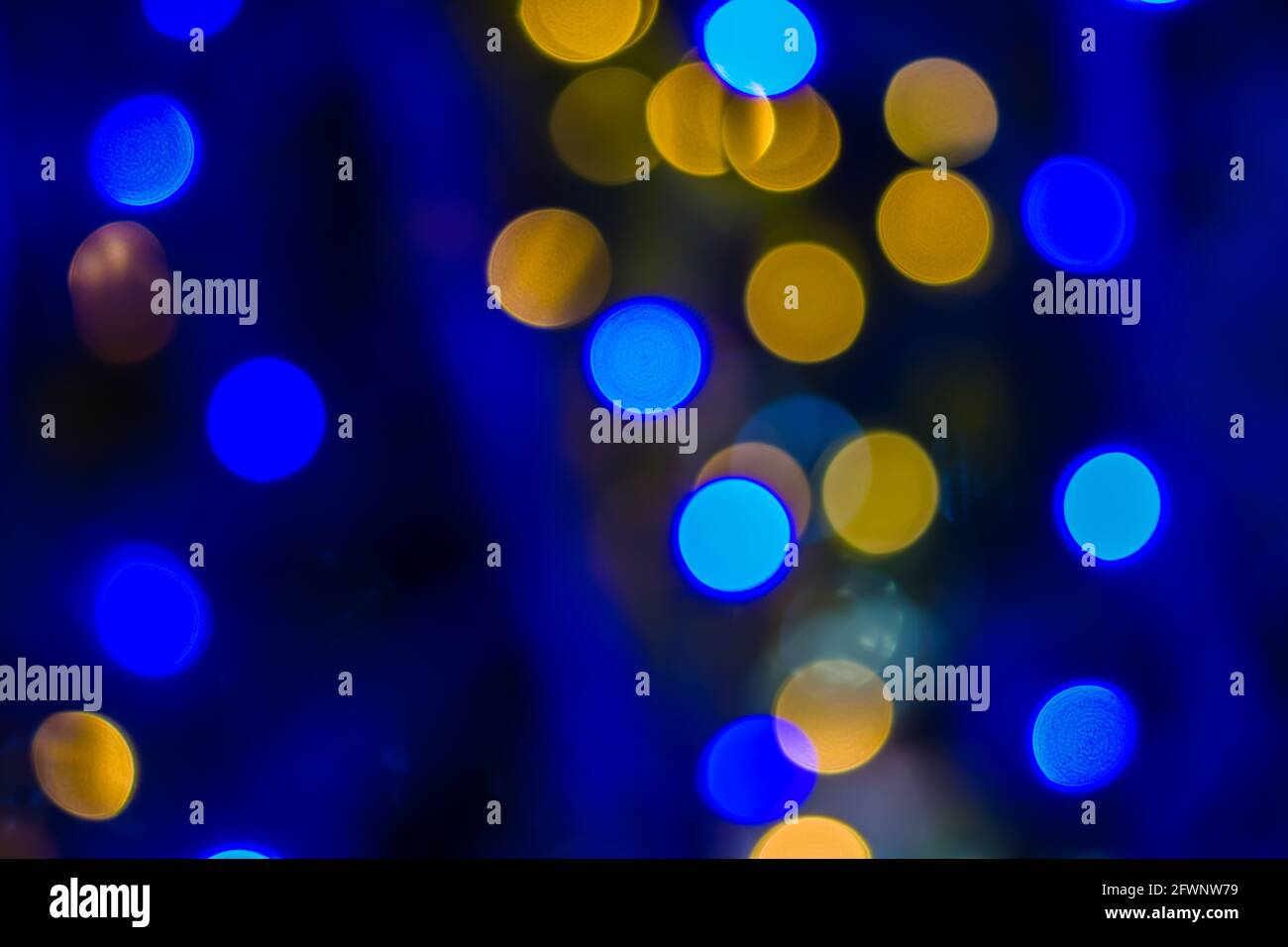 Defocused ligths of blue Christmas tree background Stock Photo - Alamy